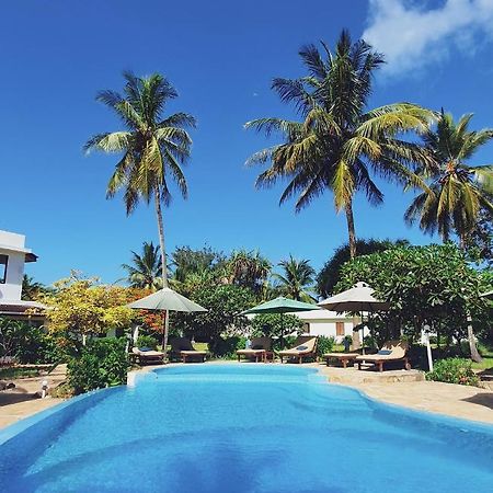 Flame Tree Cottages Нунгви Экстерьер фото