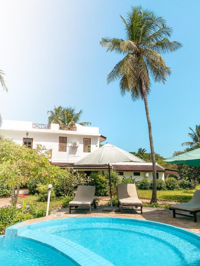 Flame Tree Cottages Нунгви Экстерьер фото