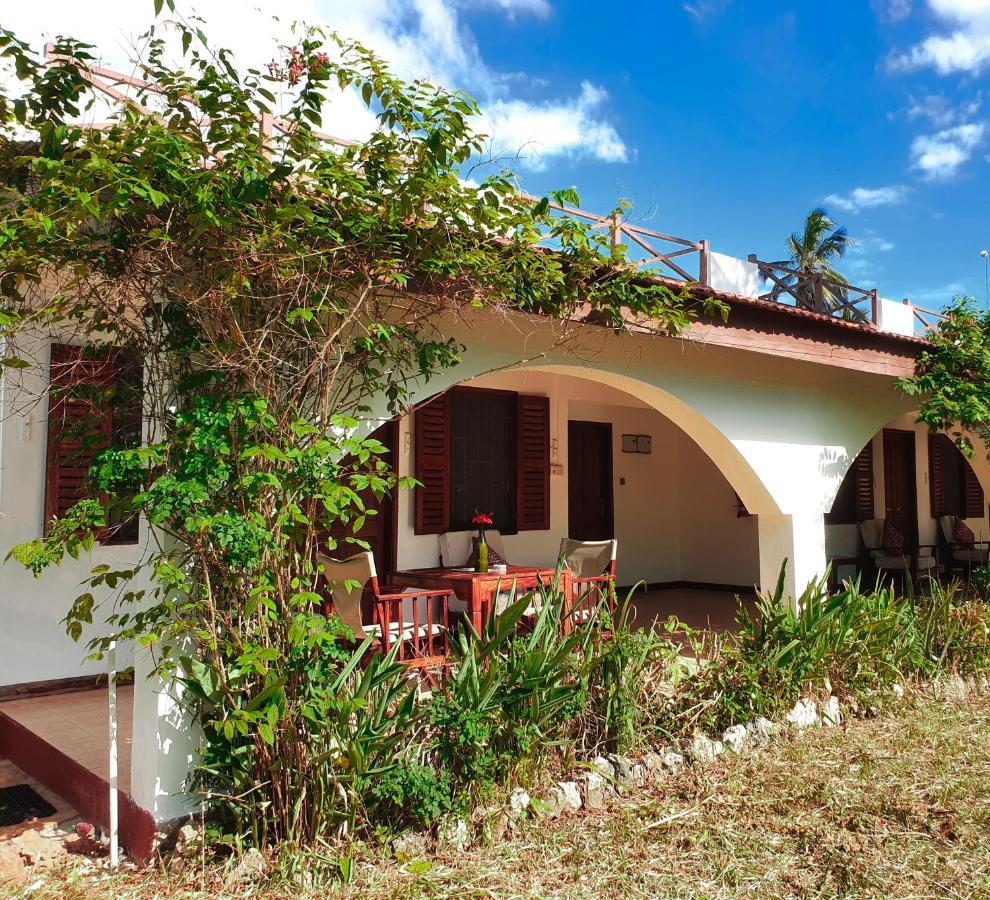 Flame Tree Cottages Нунгви Экстерьер фото
