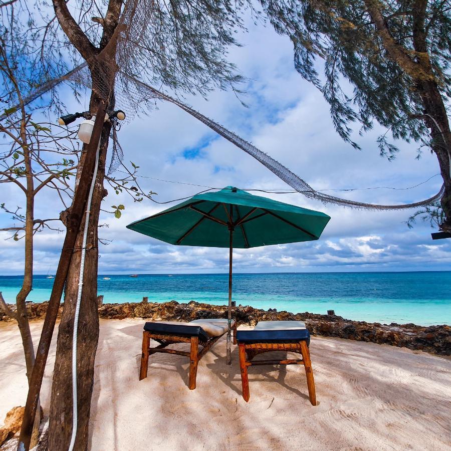 Flame Tree Cottages Нунгви Экстерьер фото