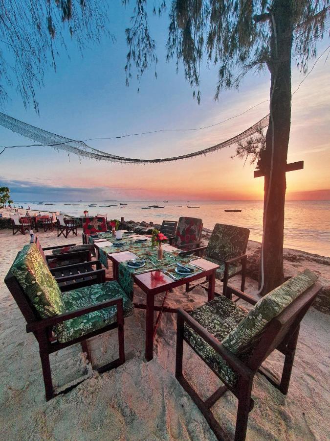 Flame Tree Cottages Нунгви Экстерьер фото