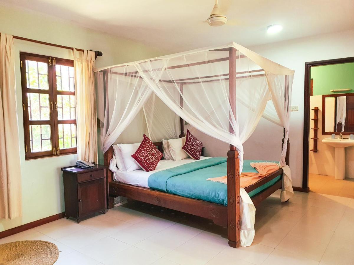 Flame Tree Cottages Нунгви Экстерьер фото