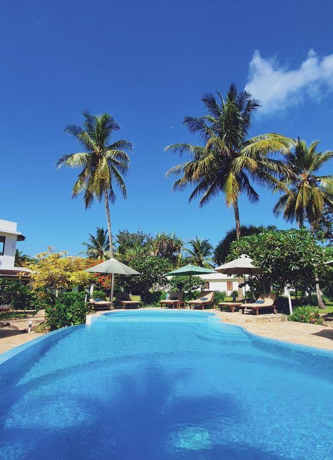 Flame Tree Cottages Нунгви Экстерьер фото