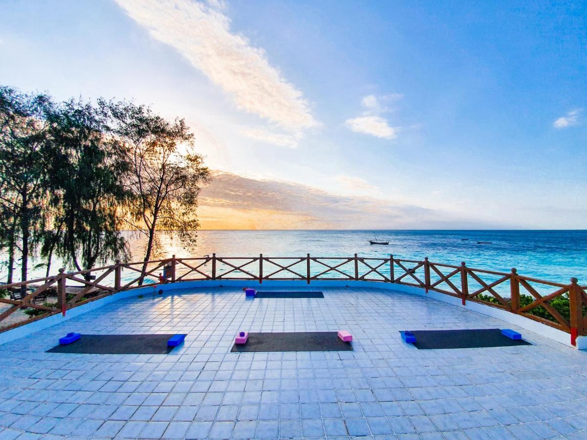 Flame Tree Cottages Нунгви Экстерьер фото