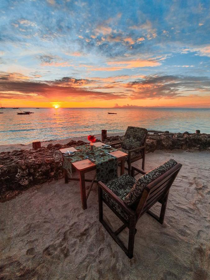 Flame Tree Cottages Нунгви Экстерьер фото