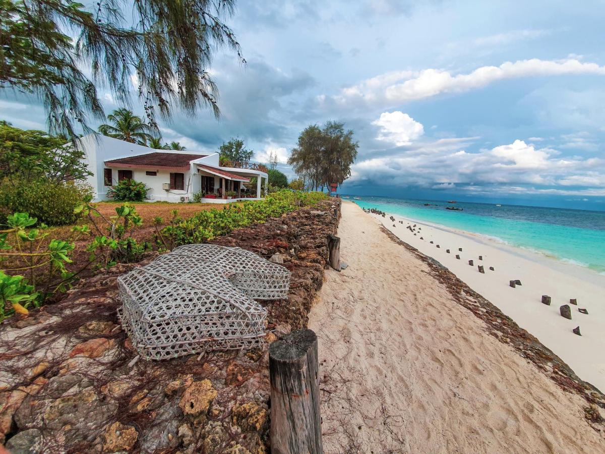 Flame Tree Cottages Нунгви Экстерьер фото
