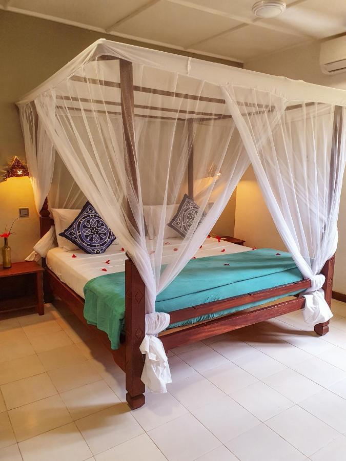 Flame Tree Cottages Нунгви Экстерьер фото