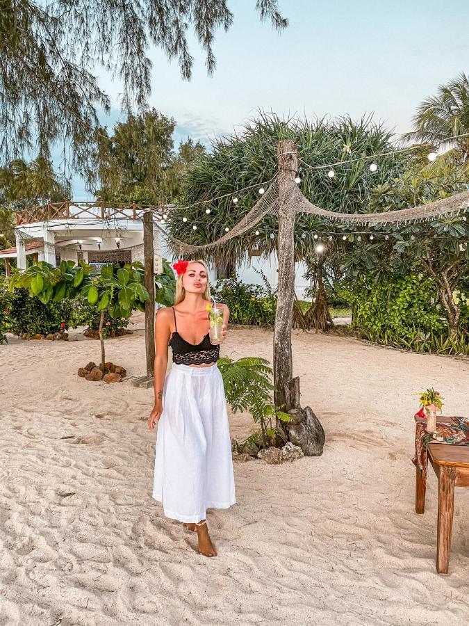 Flame Tree Cottages Нунгви Экстерьер фото