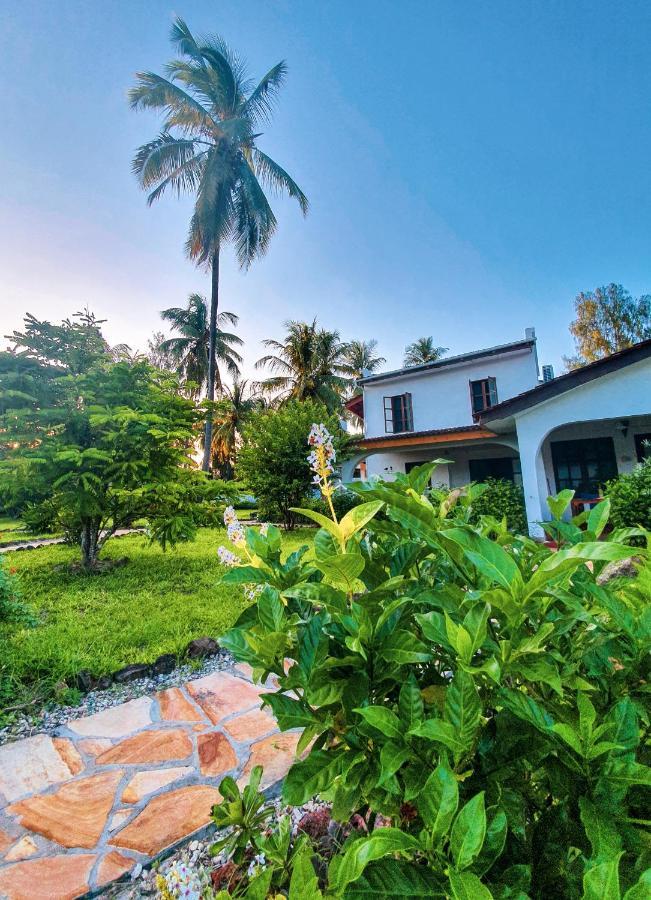 Flame Tree Cottages Нунгви Экстерьер фото