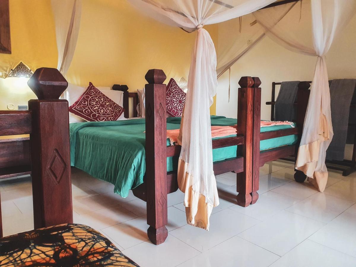 Flame Tree Cottages Нунгви Экстерьер фото