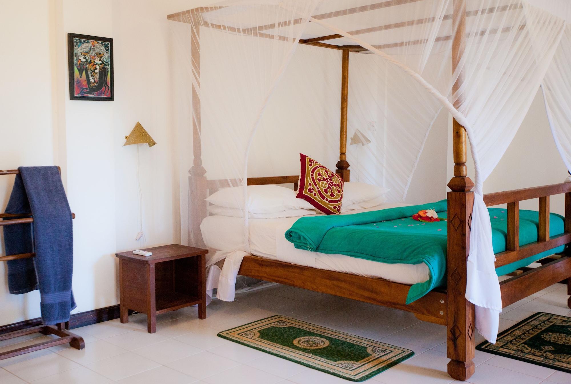 Flame Tree Cottages Нунгви Экстерьер фото