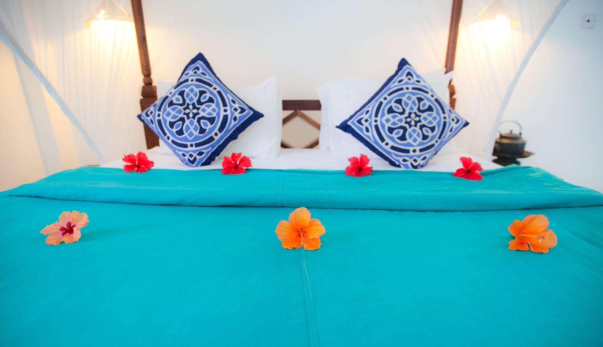 Flame Tree Cottages Нунгви Экстерьер фото