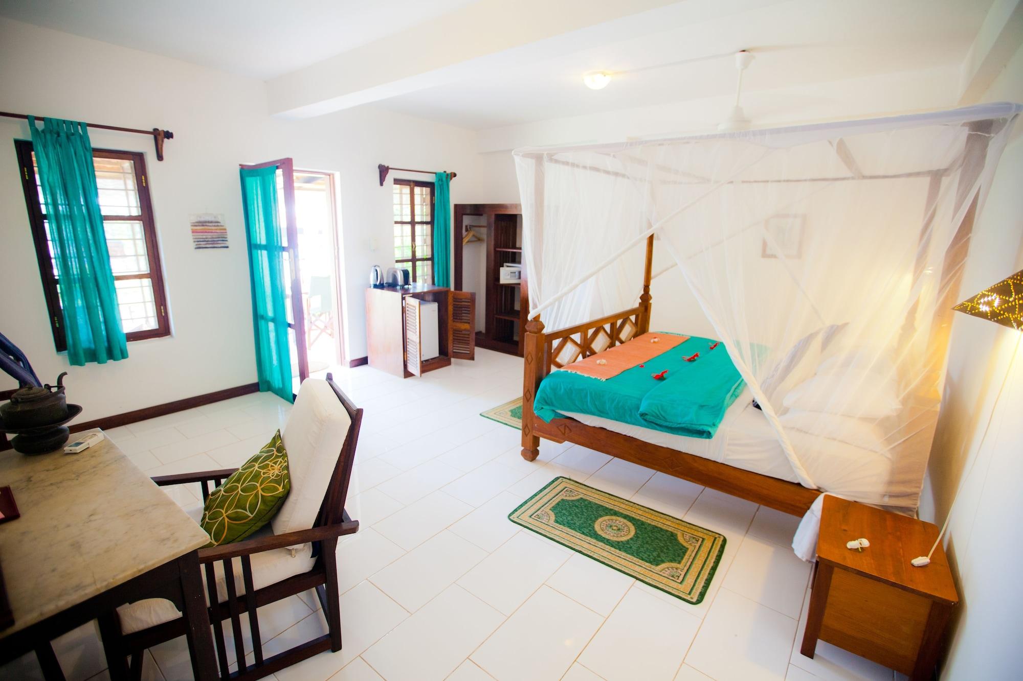 Flame Tree Cottages Нунгви Экстерьер фото