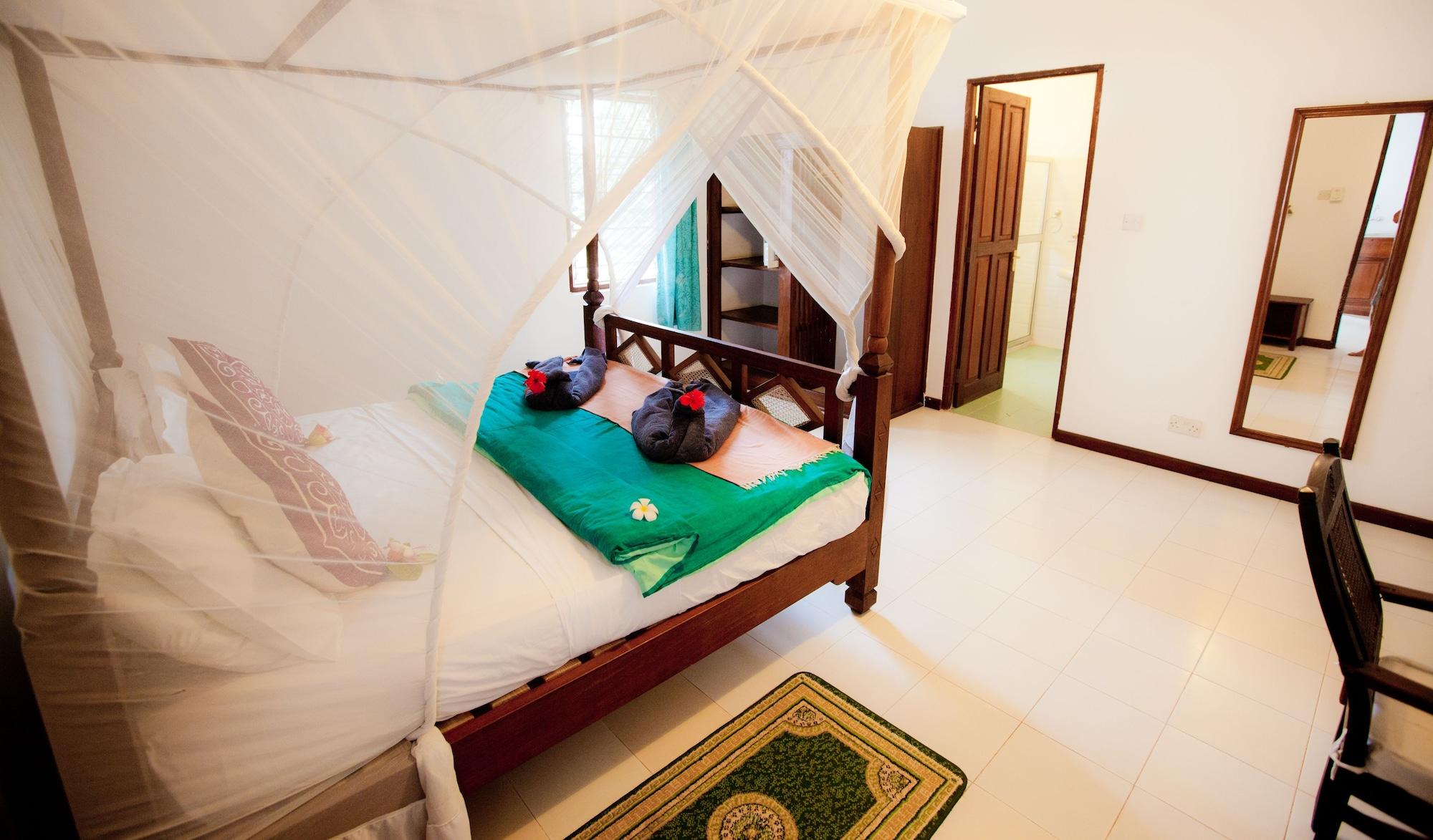 Flame Tree Cottages Нунгви Экстерьер фото