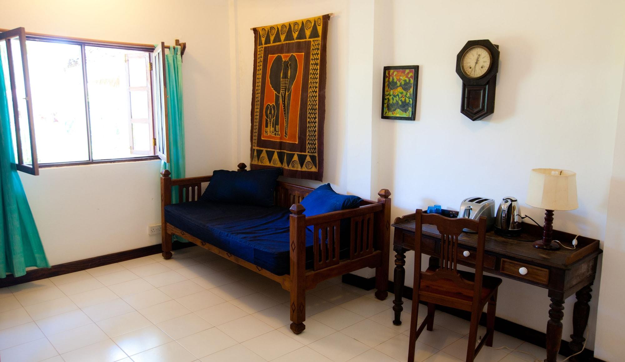 Flame Tree Cottages Нунгви Экстерьер фото